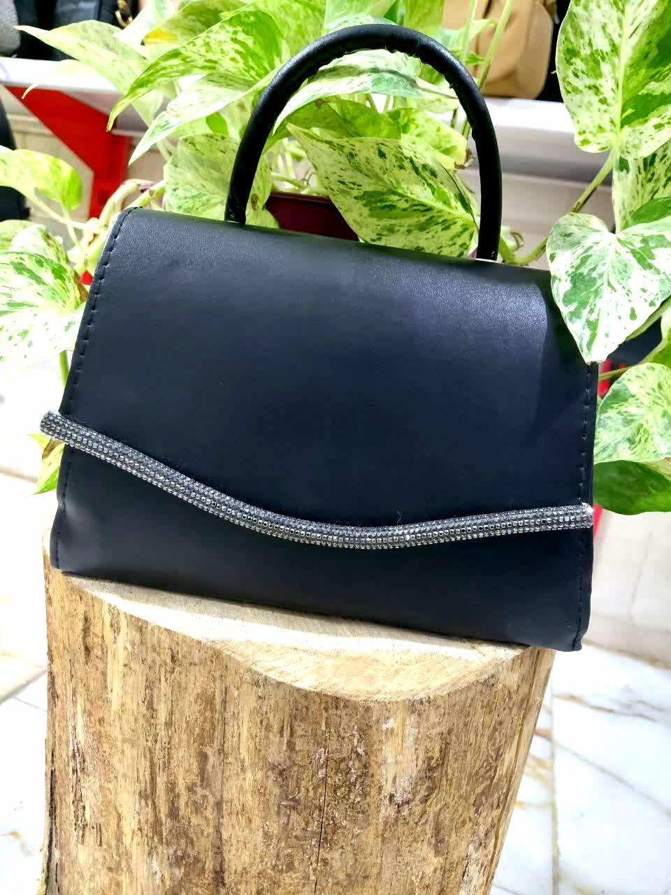 کیف نیناز جنس چرم شسته زنانه